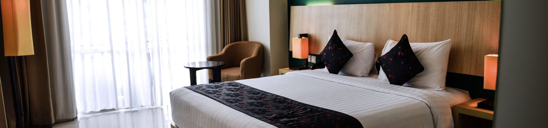 room_deluxe double balcony_the kana kuta hotel